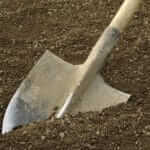 spade ready to prepare vegetable bed for sowing